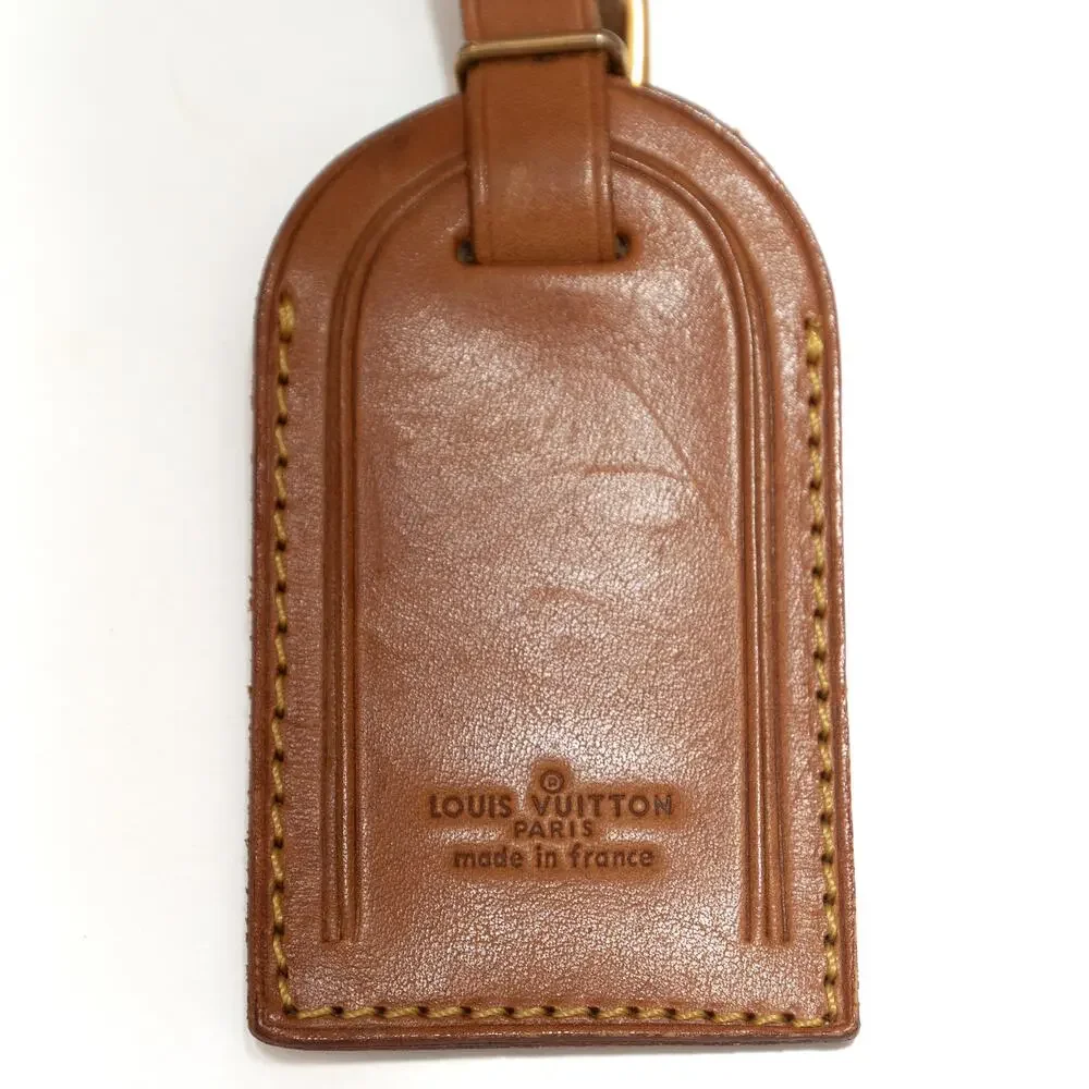 Louis Vuitton features leather